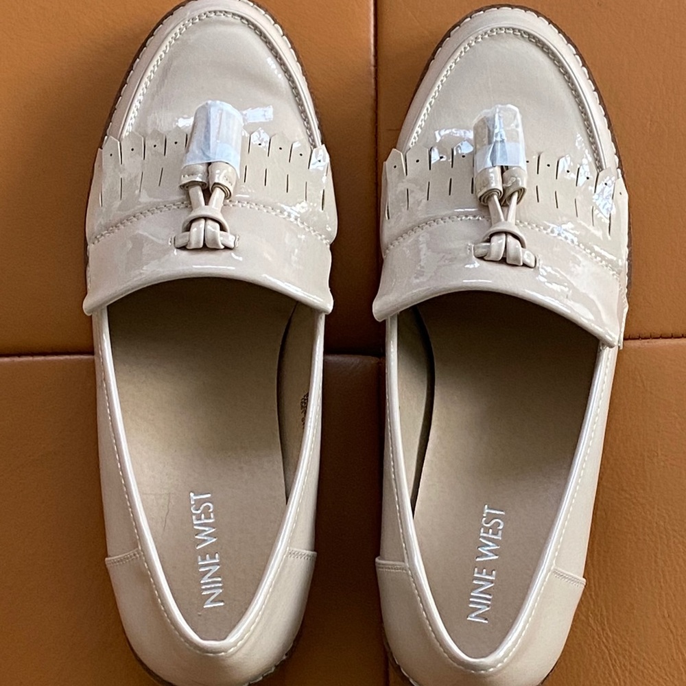 Nine West tasseled loaders Cream colored flats